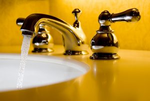 An image of a running faucet