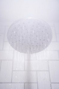 hot shower running, steamed up bathroom